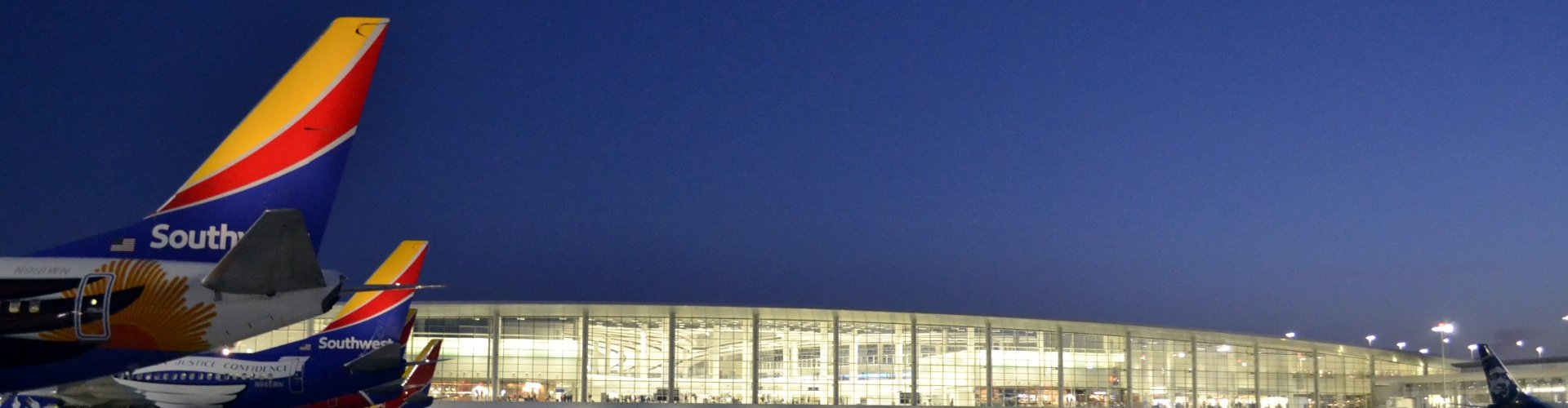 Louis Armstrong New Orleans Intl Airport hotel exterior at dusk